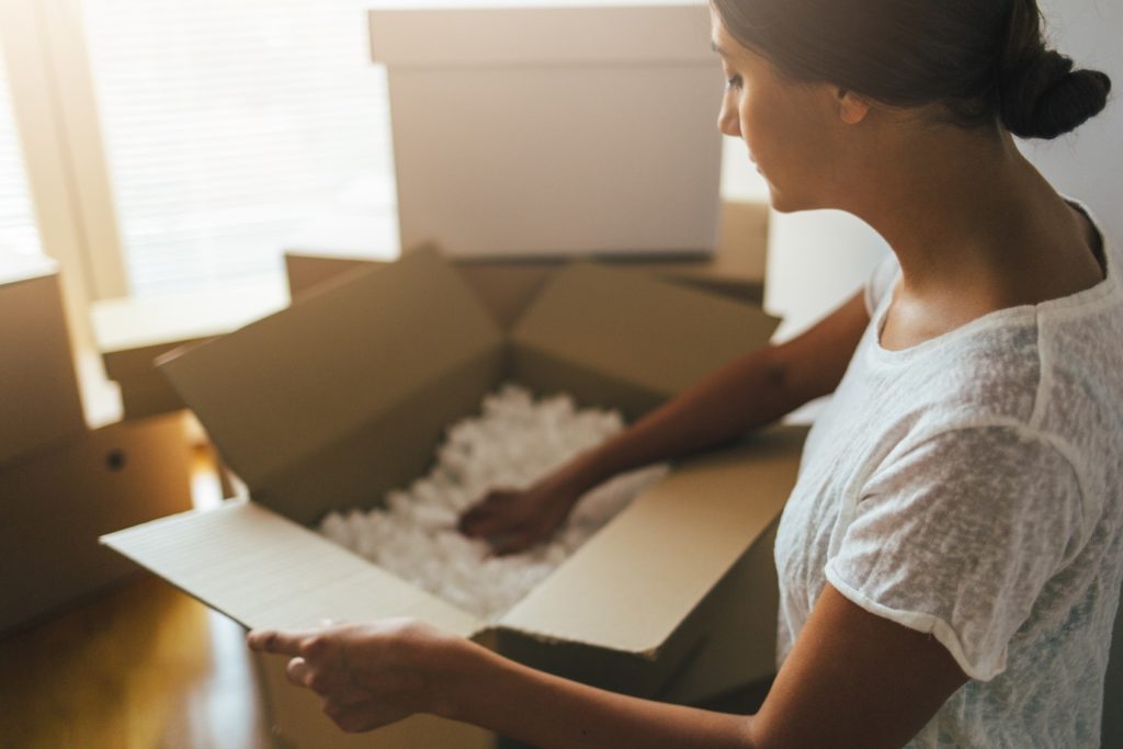 woman is opening storage box