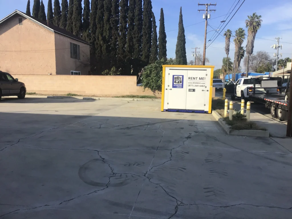 Box-N-Go self storage unit placed in a Hollywood driveway, offering portable and mobile storage units near 90028, climate-controlled and secure storage for students and local residents.