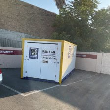 Box-N-Go storage unit placed near a residential area in Miracle Mile, CA, providing self storage in 90016, mobile storage along Jefferson Blvd, student storage for USC, and secure, climate-controlled options near Baldwin Hills and Adams Blvd.