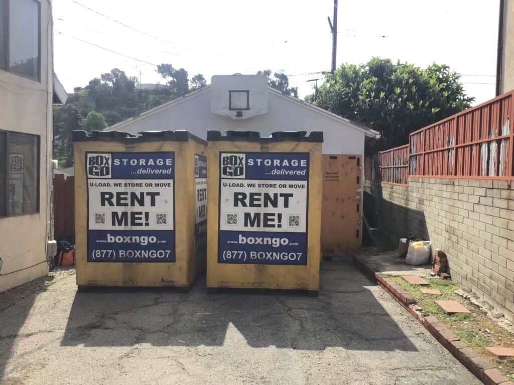 Two Box-n-Go storage containers in an alley in Sawtelle