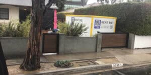 Storage container named Box N Go Rent Me inside the house yard in Sherman Oaks