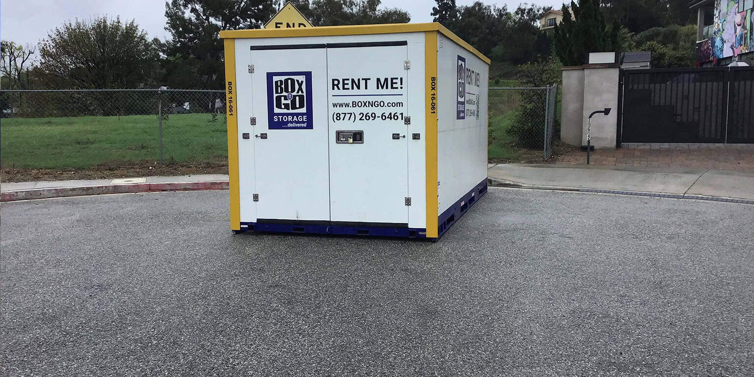 Box-n-Go storage container placed at the end of a residential street in Santa Monica on a cloudy day.