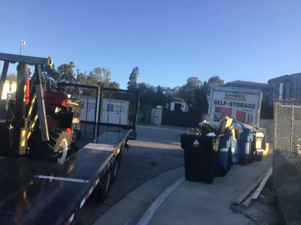 U-Haul and Box-N-Go storage units near Sawtelle, 90025, with trash bins and equipment, showing mobile and portable storage in West LA near Santa Monica Blvd, Olympic Blvd, and UCLA.