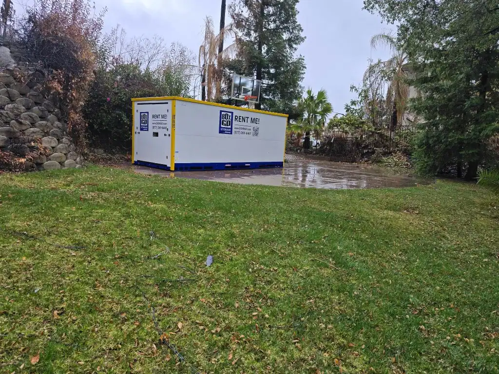 Box-N-Go mobile storage container on a driveway, ideal for self storage in West LA, student storage near UCLA, and secure, climate-controlled storage in Sawtelle.