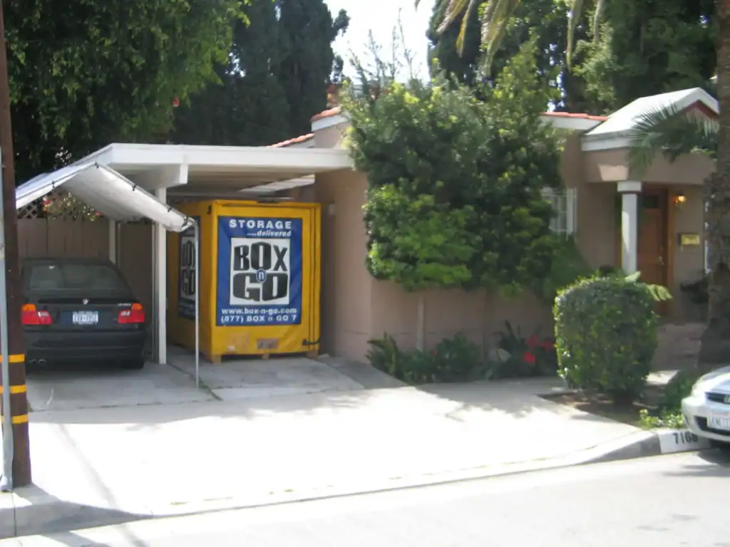 Affordable self storage in Pico Rivera CA with Box-n-Go portable storage container conveniently placed at a residential home driveway.