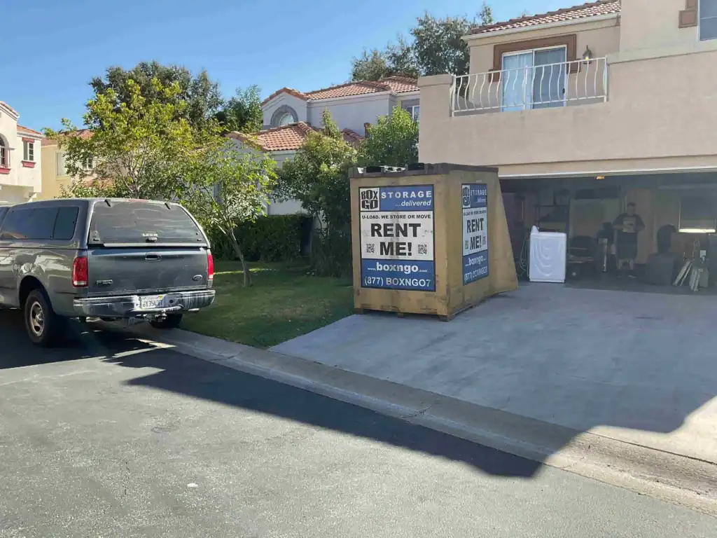 Box-n-Go portable container in front of a Brentwood home garage, providing convenient short term storage Brentwood residents use for moving and decluttering.