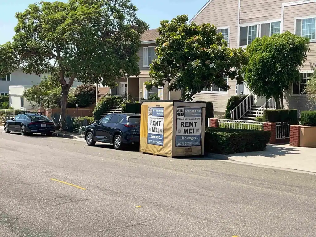Box-n-Go portable containers placed on a residential street, offering convenient and affordable self storage in Norwalk CA.