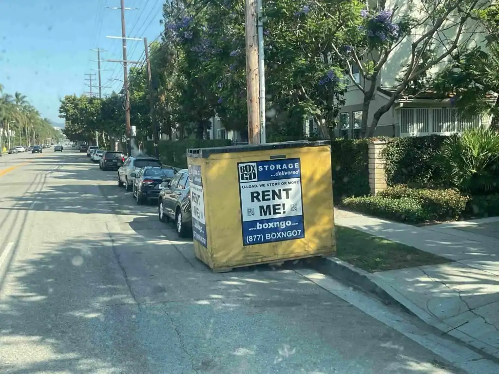 Box-n-Go portable self storage container placed on a residential street in Bellflower CA, offering convenient and flexible self storage solutions for local residents and businesses.