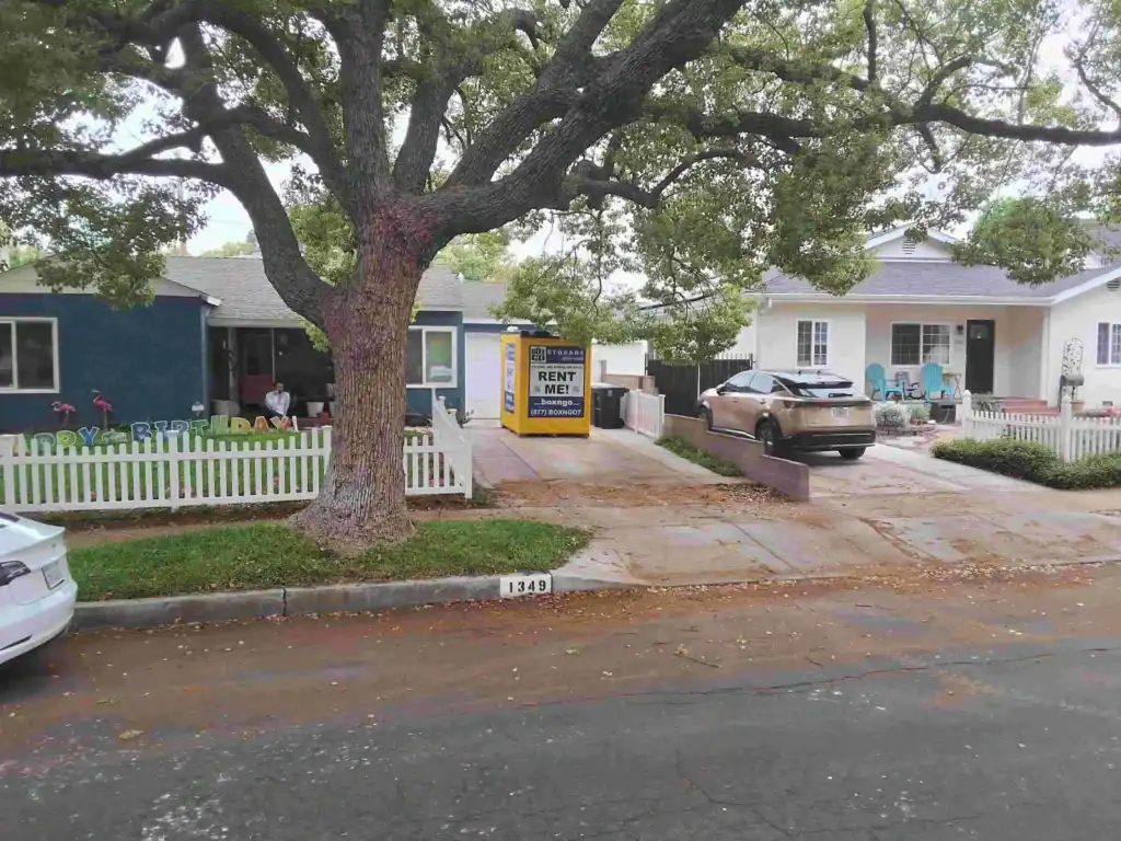 Box-n-Go portable self storage in Beverly Hills CA placed in a residential driveway for convenient moving and storage solutions.