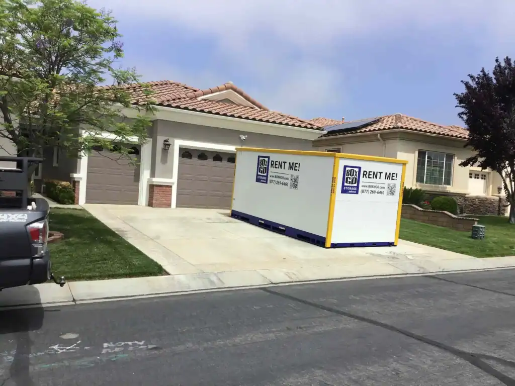 Box-n-Go portable self storage in Brentwood CA placed on a residential driveway for secure and convenient moving and storage solutions.
