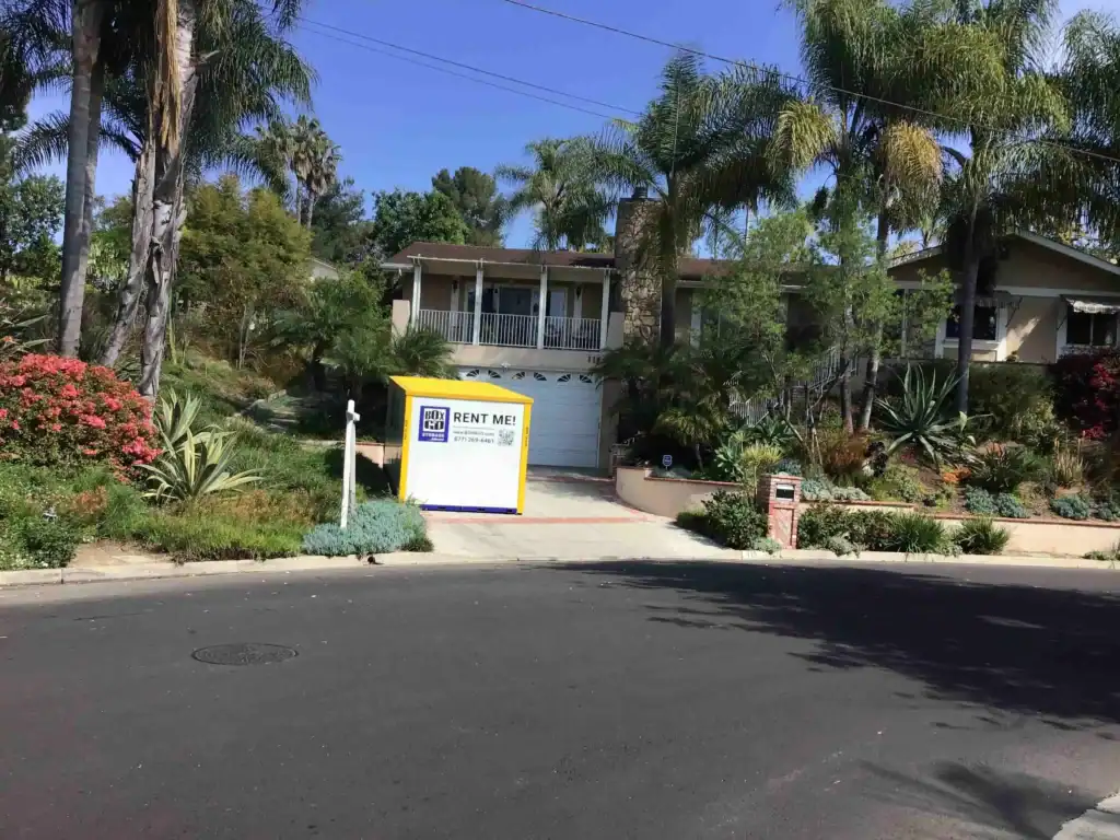 Box-n-Go portable self storage in Brentwood CA placed on a residential driveway for secure and convenient storage rental solutions.