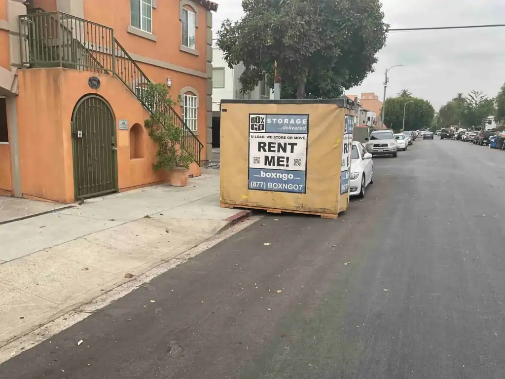 Box-n-Go portable storage container on a Santa Monica street, providing secure and convenient office inventory storage near residential buildings.