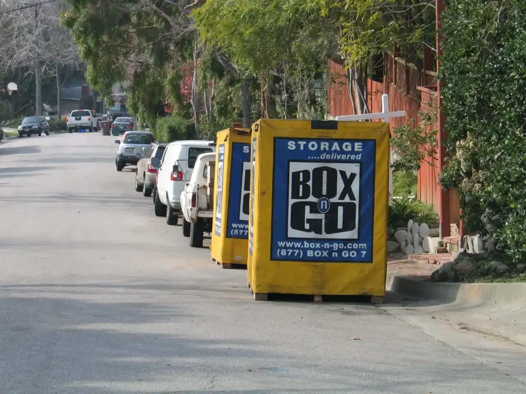Box-n-Go portable storage container placed curbside in a residential neighborhood, offering a flexible alternative to traditional garage rental space.