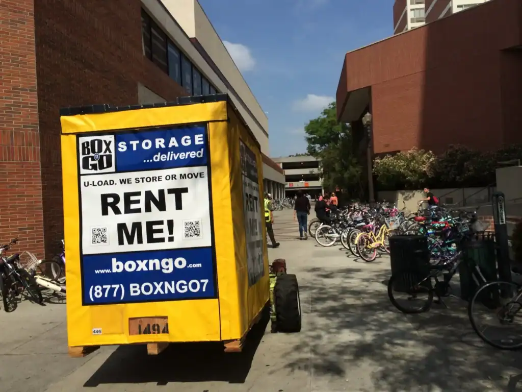 Box-n-Go portable storage unit placed on a college campus walkway, providing convenient student storage near West Hollywood for dorm move-outs, summer storage, and college relocations.
