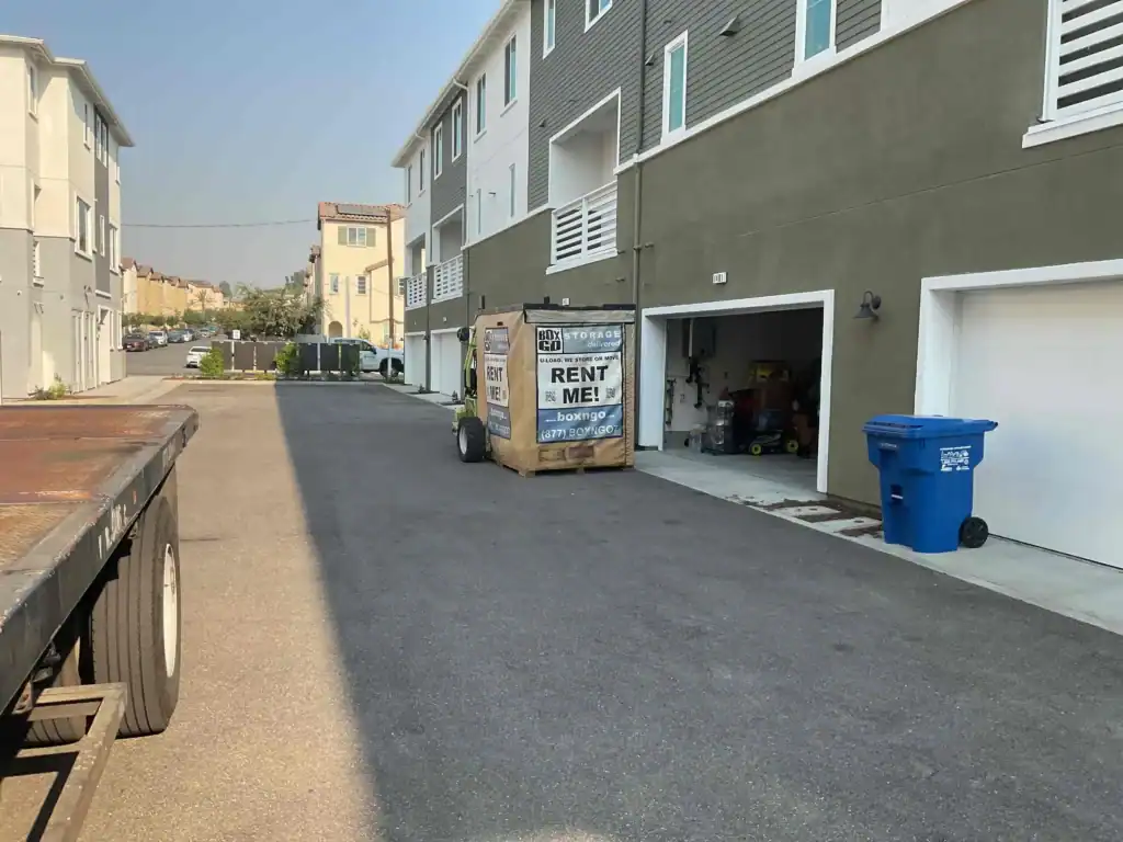 Box-n-Go portable unit placed near modern townhomes in Santa Monica, used for convenient office inventory storage solutions.