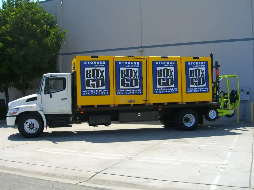 Box-n-Go storage truck loaded with portable containers, offering secure and convenient long term storage solutions for households, students, and businesses.