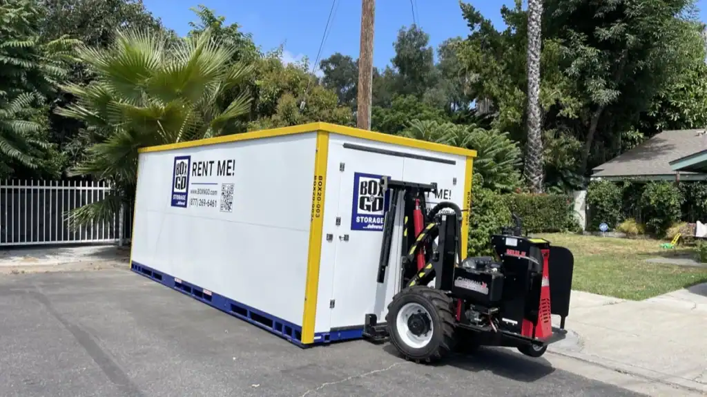 Mobile Box-n-Go container delivered to a residential neighborhood for convenient self storage in Downey CA, featuring portable storage solutions for homes and businesses.