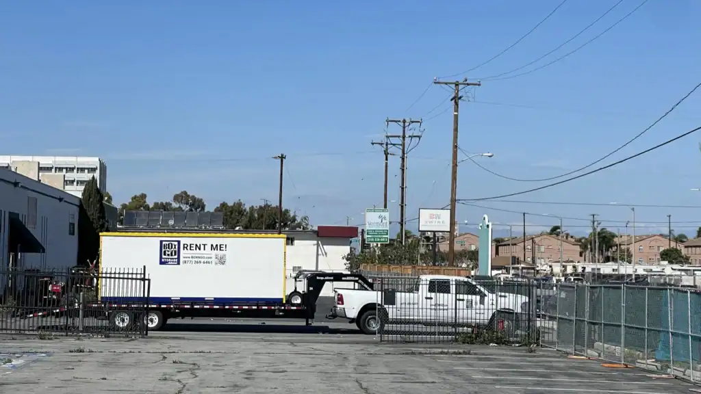 Mobile self storage in South Gate CA with a Box-n-Go portable storage container on a trailer, offering convenient and affordable storage rental solutions.