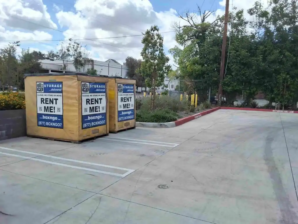 Playa Vista Storage portable Box-n-Go containers placed in outdoor parking lot for convenient self storage and moving services.