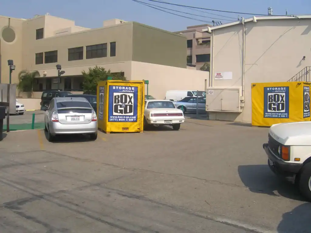 Portable Box-n-Go self storage units placed in a commercial parking lot in Monterey Park CA, offering convenient and flexible self storage in Monterey Park CA for businesses and residents.