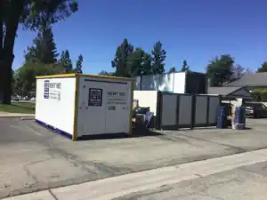 Portable storage containers and moving boxes in a Santa Monica neighborhood, illustrating practical decluttering tips Santa Monica residents can use for organizing, storing, and simplifying home spaces.