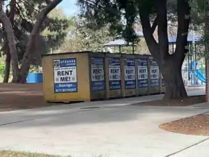 Row of Box-n-Go portable storage containers placed outdoors in Brentwood, offering flexible short term storage Brentwood residents can rent for moving, renovation, or decluttering needs.