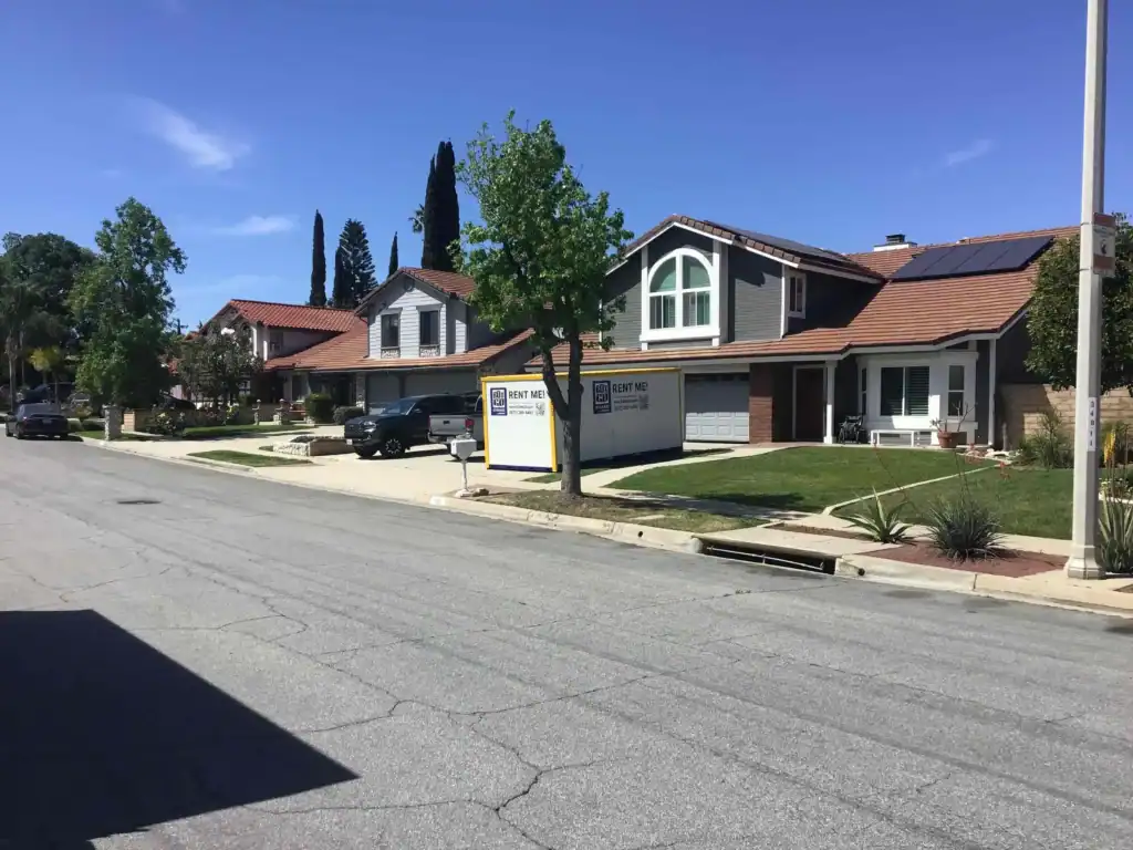 Self Storage Playa Del Rey portable storage unit placed in front of a residential home, offering convenient and secure storage rental solutions.
