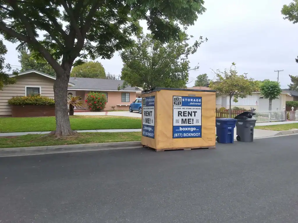 Portable self storage in East Los Angeles CA with a Box-n-Go storage container placed on a residential street for convenient moving and storage solutions.