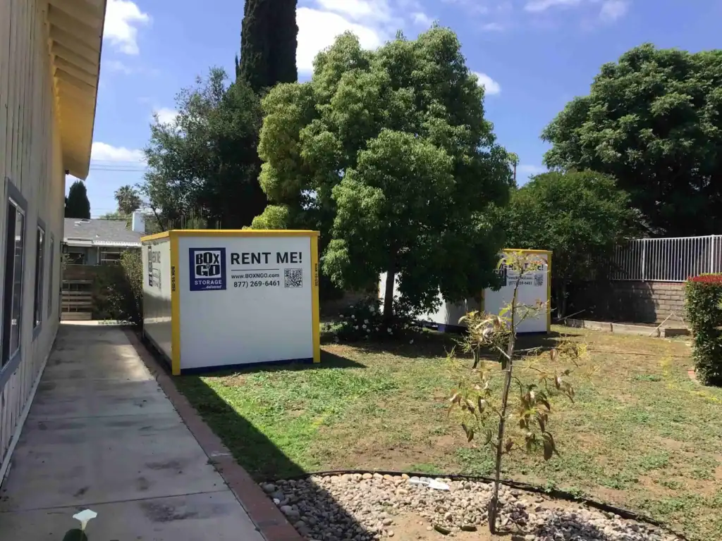 Storage Units Topanga with Box-n-Go portable storage containers placed in residential yard for convenient moving and self storage solutions.