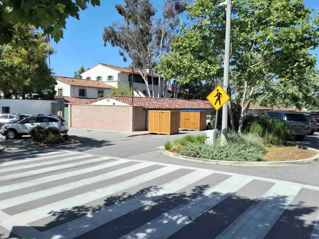 Wooden storage containers placed in a Mar Vista parking lot, providing secure film production storage Mar Vista crews rely on for props, set equipment, and gear organization.
