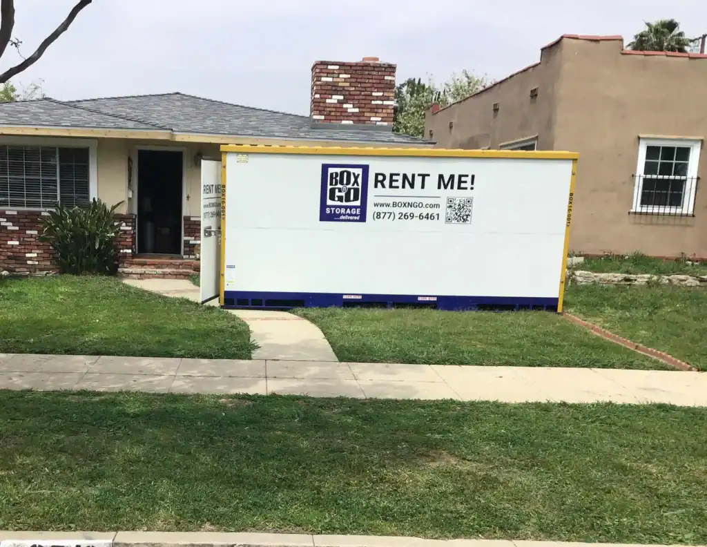 Box-n-Go portable container placed in front of a house providing convenient self storage in Maywood CA for moving and household storage solutions.