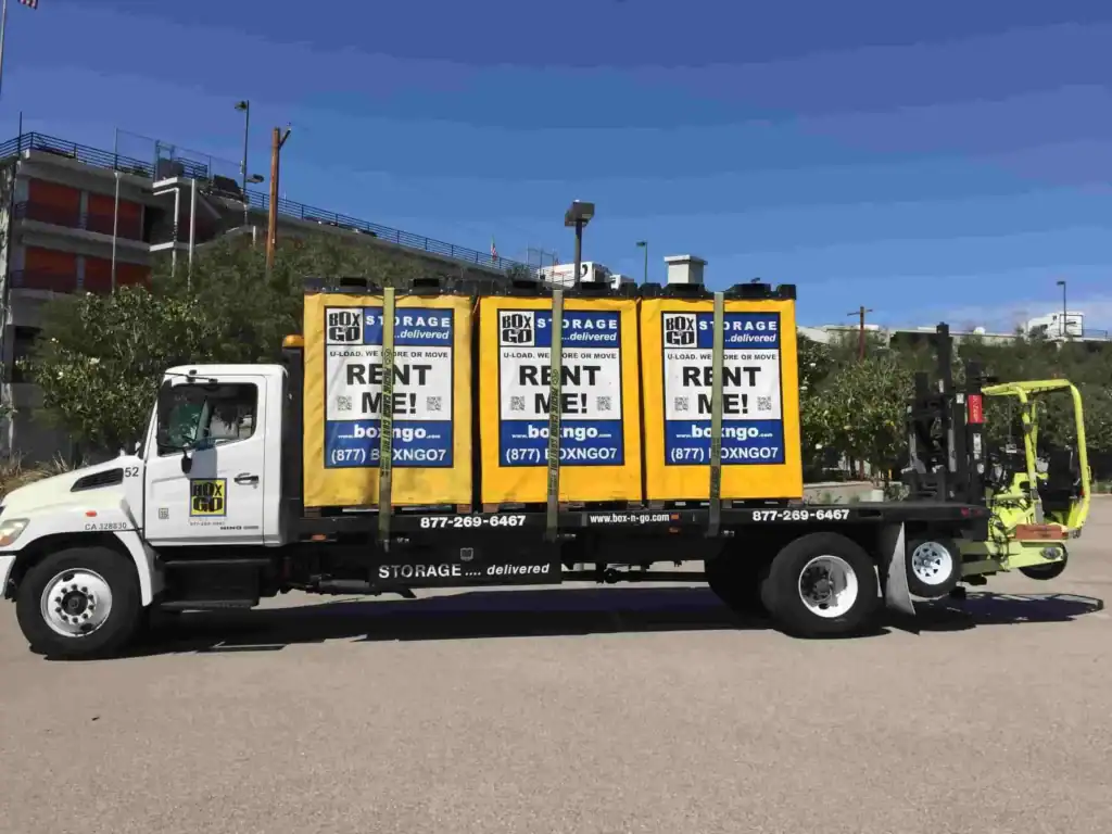 Box-N-Go portable self storage Malibu units loaded on truck.