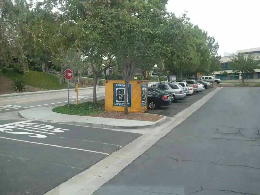 Box-n-Go portable self storage in Mar Vista CA placed near residential parking lot, providing secure and convenient storage container rentals for local residents.