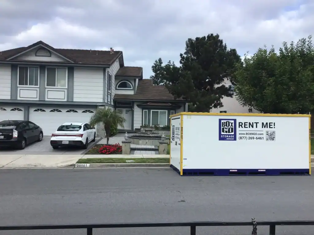 Box-n-Go portable storage container outside a residential home, showing affordable portable storage cost in Santa Monica for homeowners.