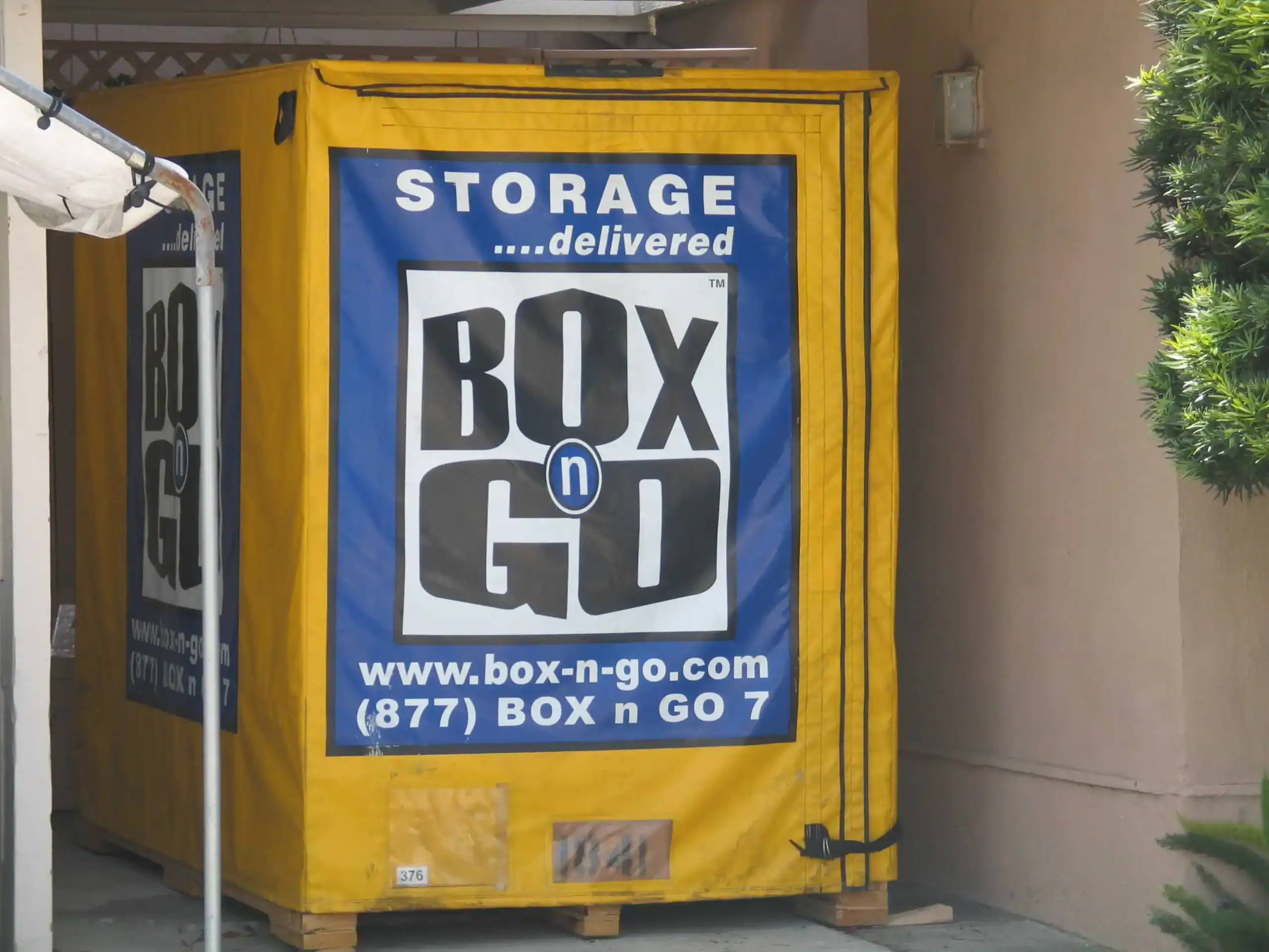 Box-n-Go portable storage container placed outside an apartment building, providing convenient and affordable student storage in Sherman Oaks for college moves and dorm transitions.
