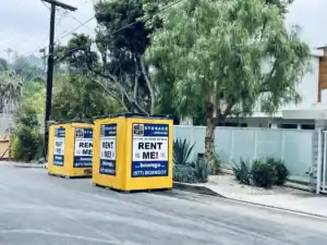 Box-n-Go portable storage containers placed on a residential street, promoting storage container rental in West Hollywood for secure and convenient moving or storage solutions.