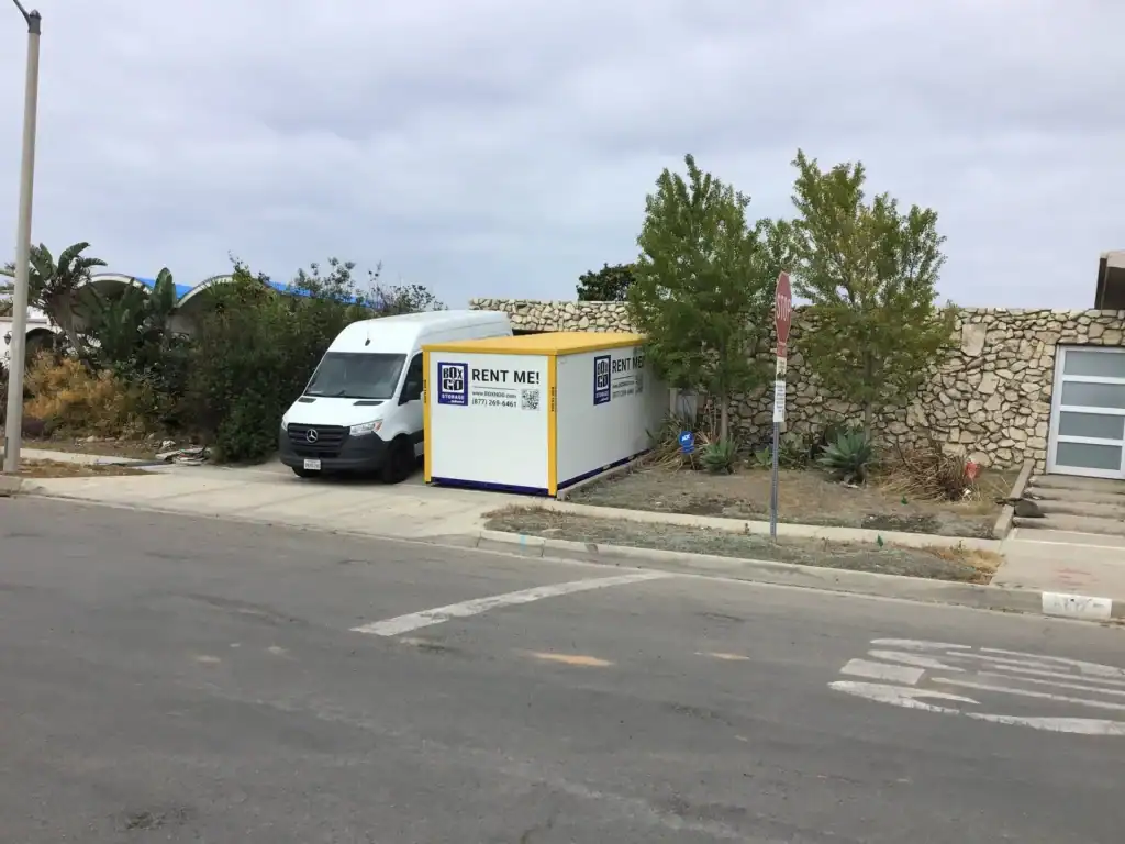Box-n-Go portable storage unit placed in front of a commercial property, providing convenient and secure business storage West Hollywood solutions for local companies.