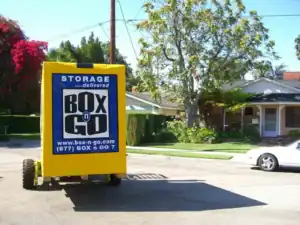 Box-n-Go portable storage unit positioned in front of a suburban home, offering convenient and cost-effective business storage in Sherman Oaks for local entrepreneurs and small offices.
