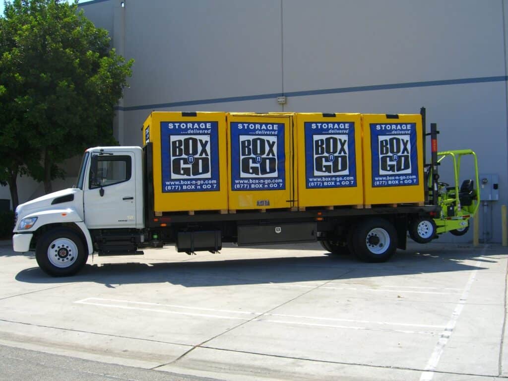 Box-n-Go truck delivering portable storage containers for long term storage in Santa Monica, offering convenient and secure storage solutions.