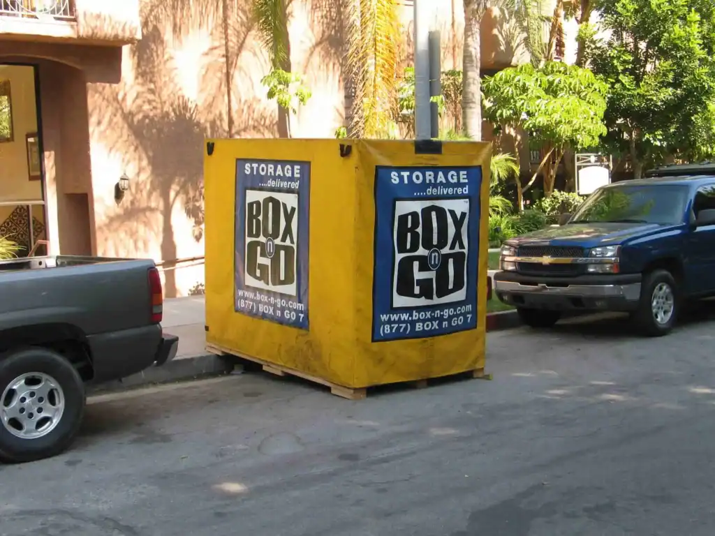 Box-n-Go yellow storage container rental placed on a residential street in Sherman Oaks, showing convenient and secure temporary storage solutions for homes and apartments.