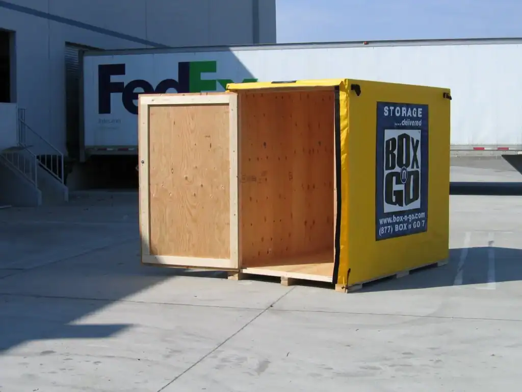 Open Box-n-Go portable storage container in an industrial lot, ideal for secure and flexible long term storage in Sherman Oaks for personal belongings, inventory, or business equipment.