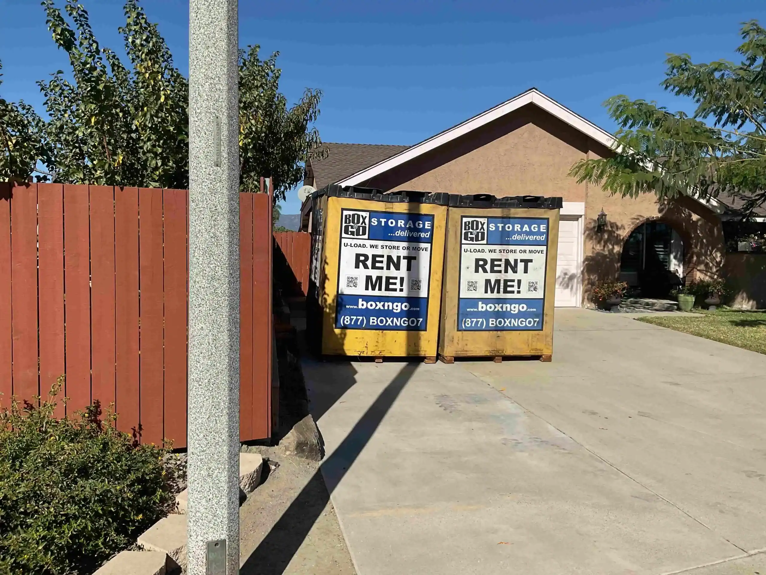 Two BoxnGo self storage units in Agua Dulce CA positioned in a residential driveway for easy and secure on-site storage during a move or renovation.