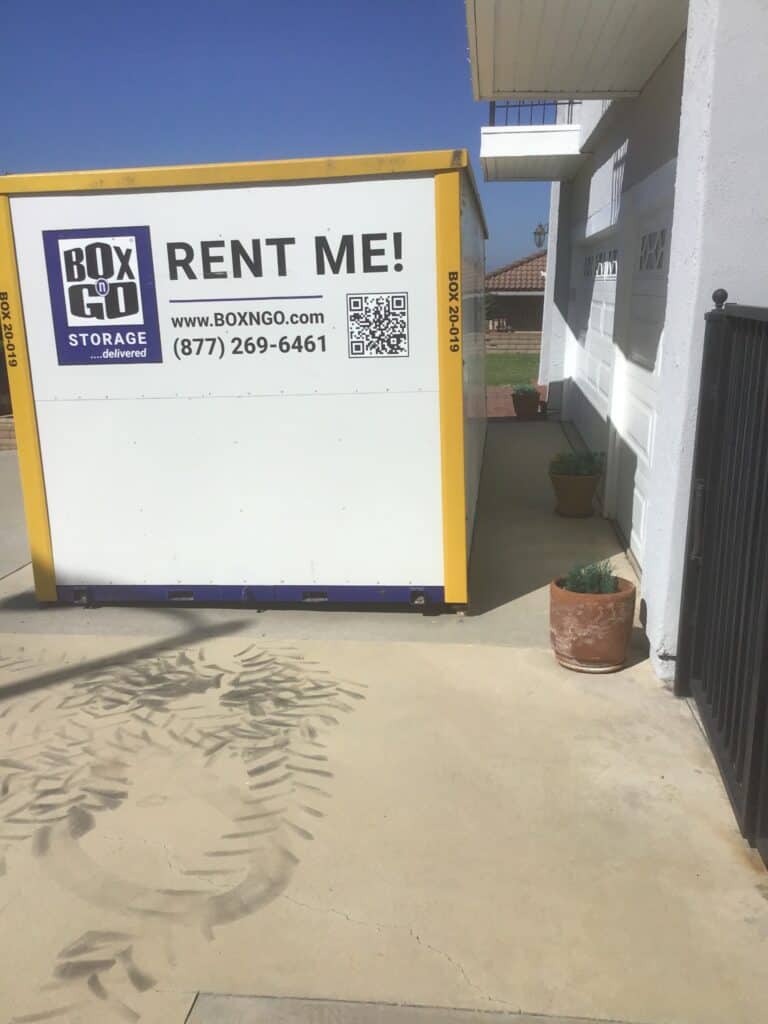 Self storage Panorama City container in front of home garage