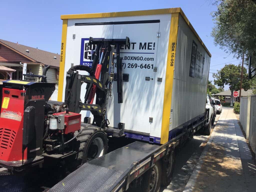 Portable storage unit being unloaded from a delivery truck in Tujunga, CA.