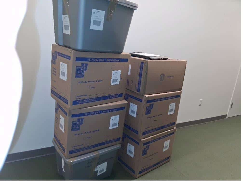 Student items including blue IKEA bags packed and labeled for self storage near chapman university.