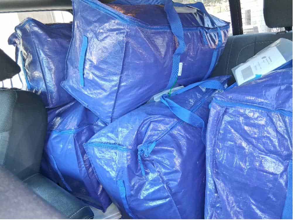 Student items including a microwave on a box packed and labeled for storage after finals Biola.