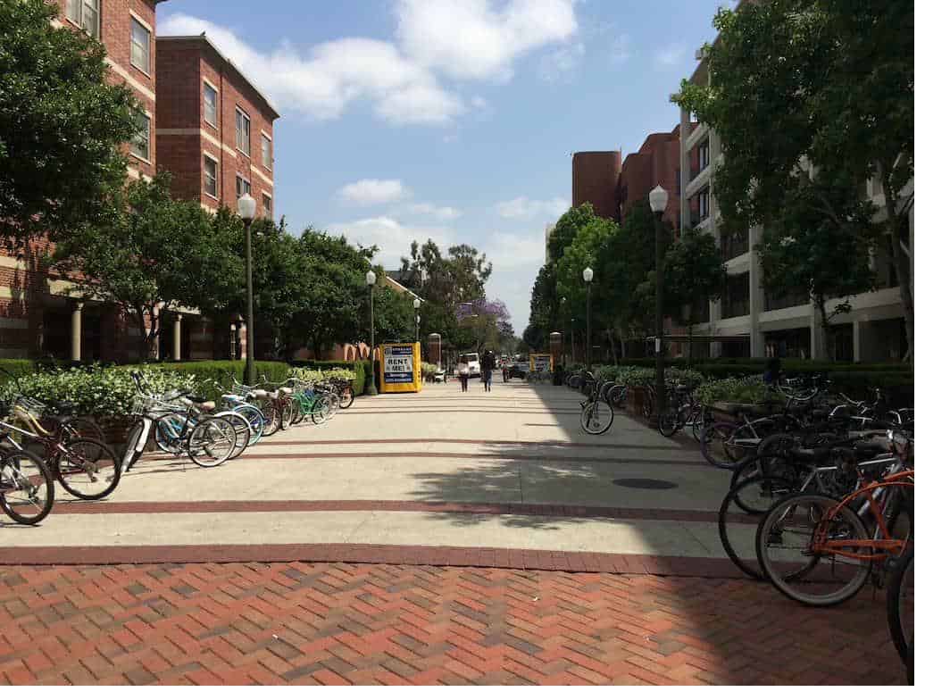 Yellow Box-n-Go summer storage unit container in a campus near the bike rack.