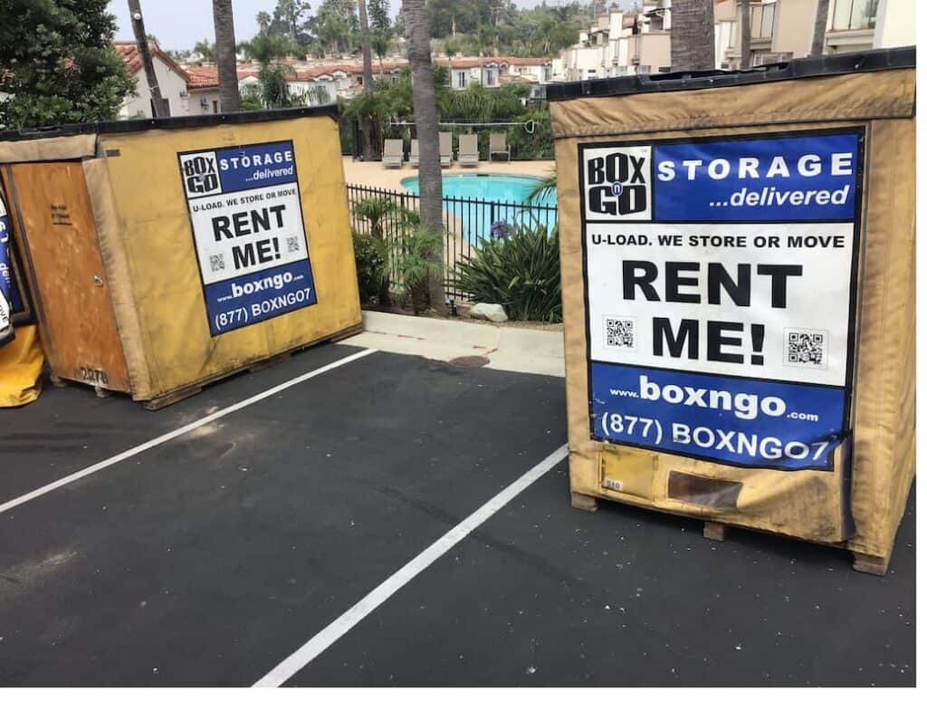 Box-n-Go portable storage containers placed at a Southern California apartment complex parking area