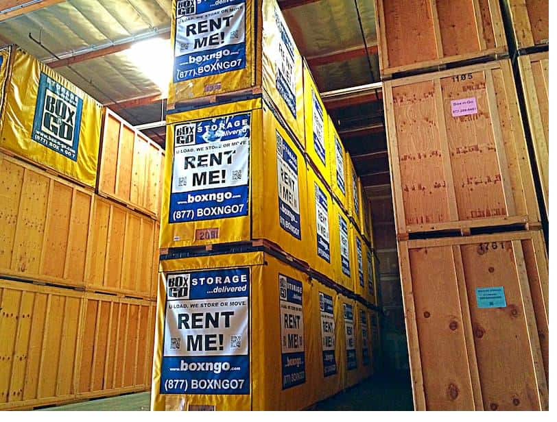 Interior of Box-n-Go's Commerce, California warehouse with portable storage containers stored indoors.