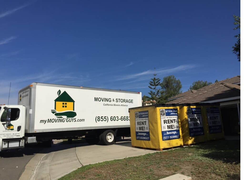 Box-n-Go containers alongside a MyMovingGuys truck during a full-service move